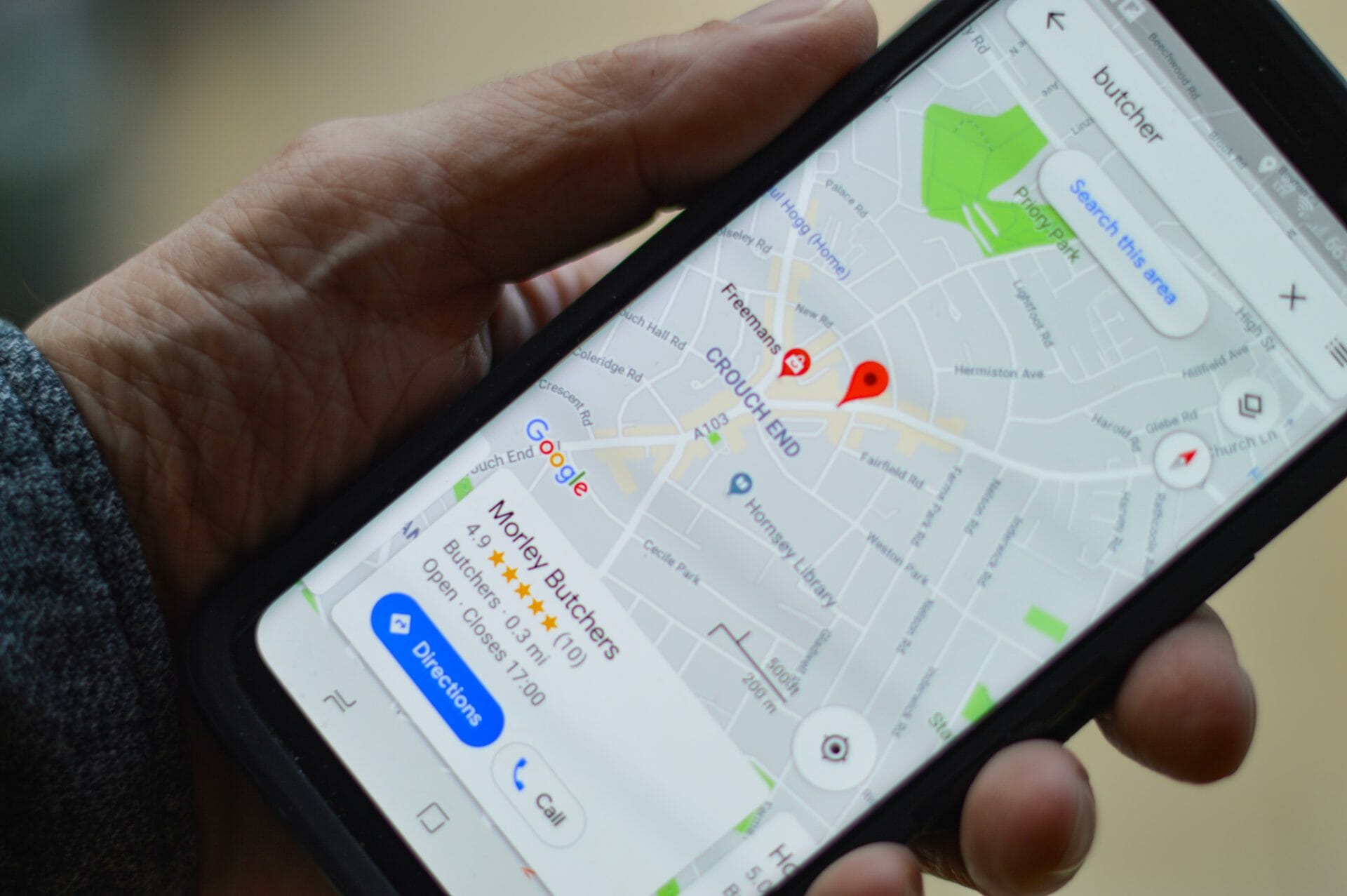 a person doing a google review of a local business
